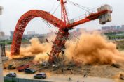 Massive crane collapsing during a heavy lifting operation